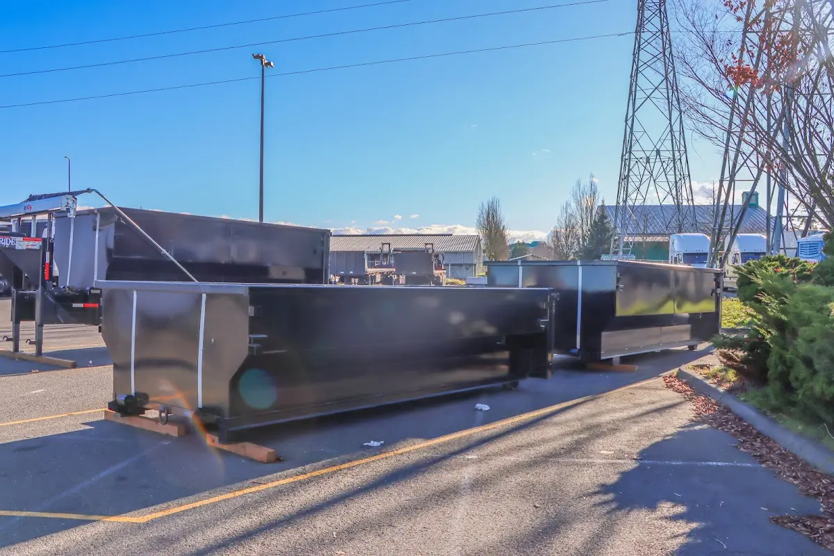 Roll-off dumpster ready for waste disposal at job site for 12 Yard Dumpster Rental in Forest Park